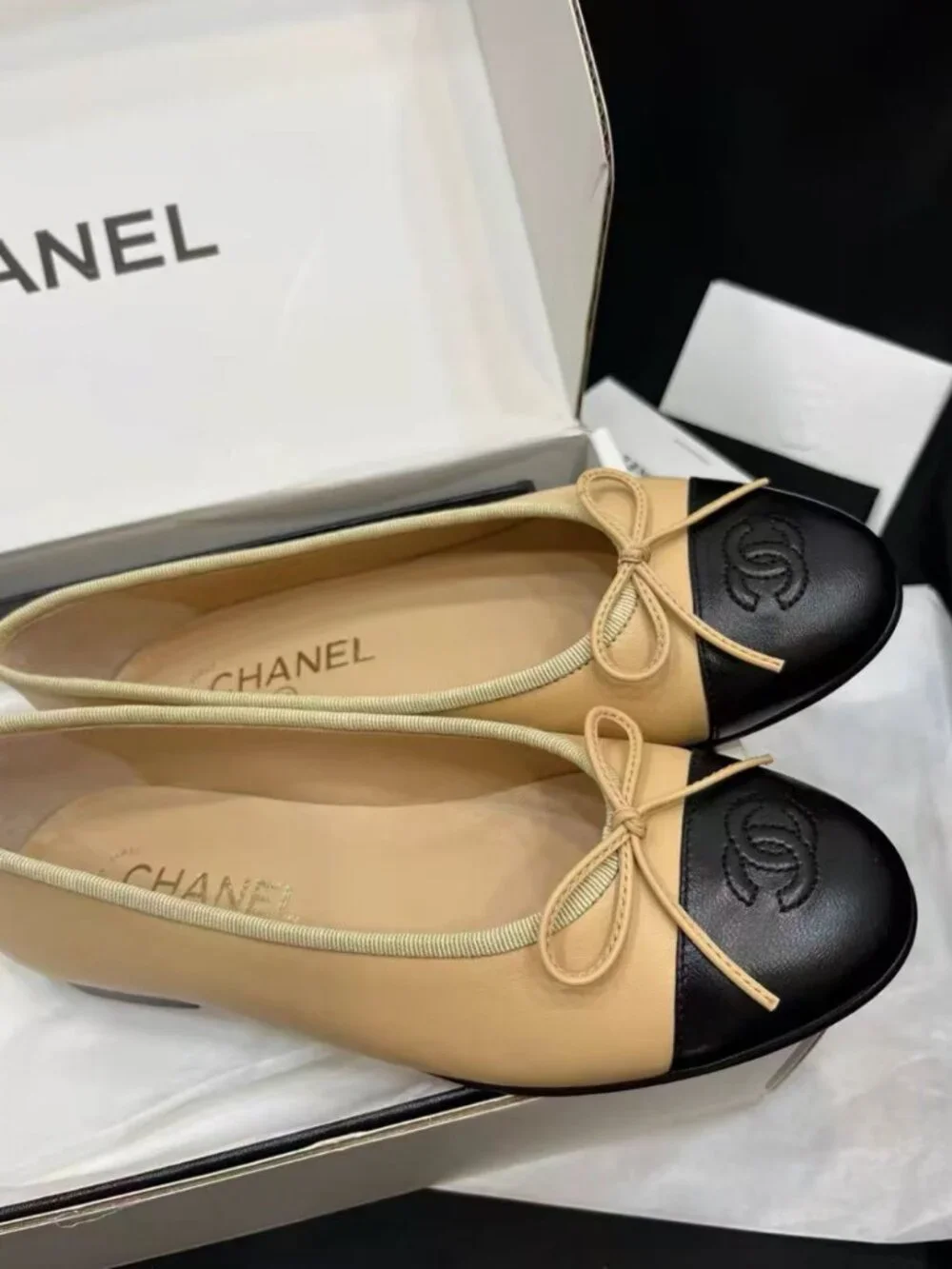 CHANEL Two‑Tone Bow‑Trim Leather Round‑Toe Ballet Flats